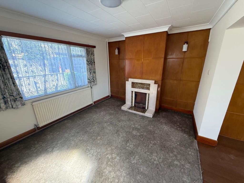 Lot: 146 - HOUSE FOR IMPROVEMENT - Living room with wood panelling